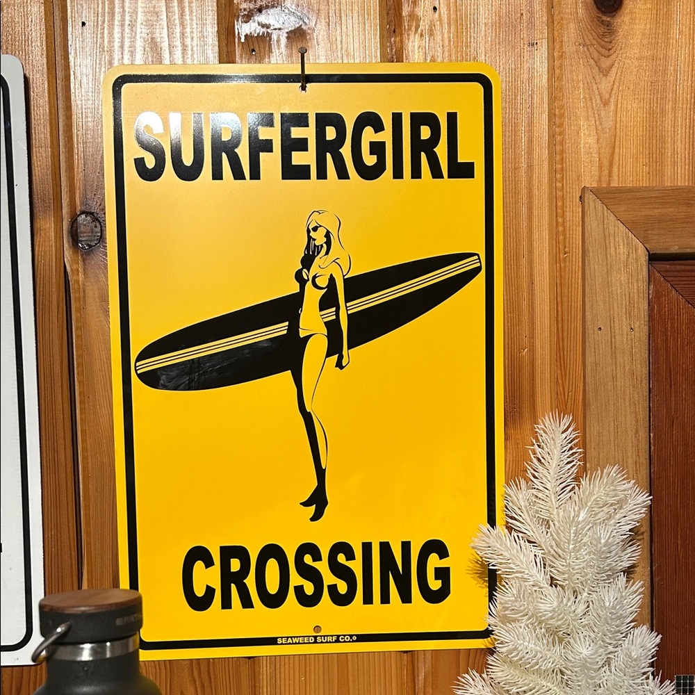 Yellow Surfer Girl Crossing Sign metal